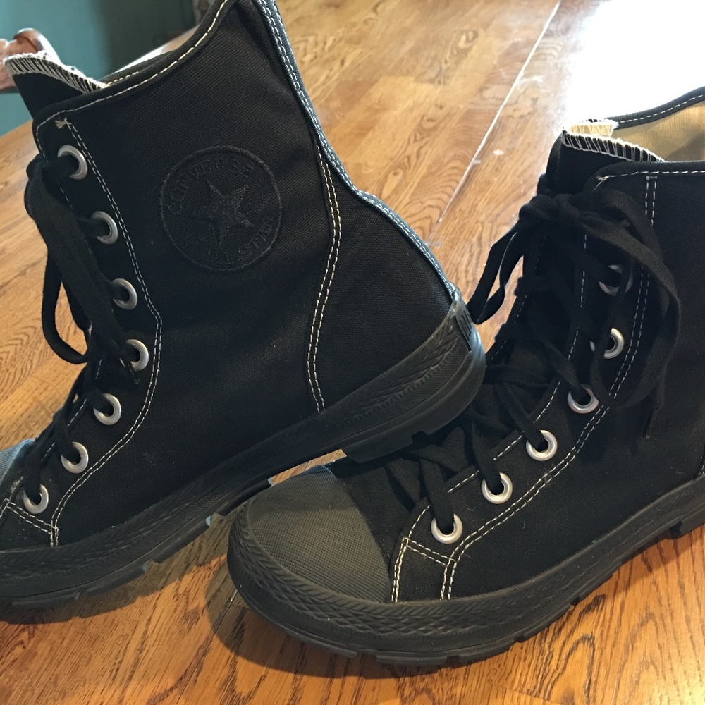 Black high top Converse shoes